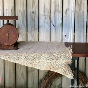 Sofa-Table-made-from-an-Aquarium-stand-and-reclaimed-lumber-Petticoat-Junktion-2.jpg