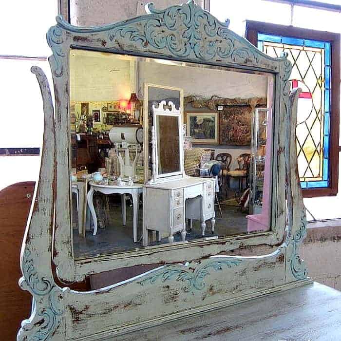 mix two shades of turquoise to paint detailed wood furniture