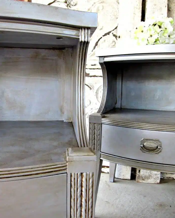 pair of nightstands painted with silver metallic paint and aged with toner