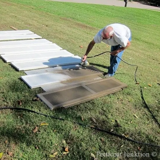 Paint louvered shutters with a paint sprayer