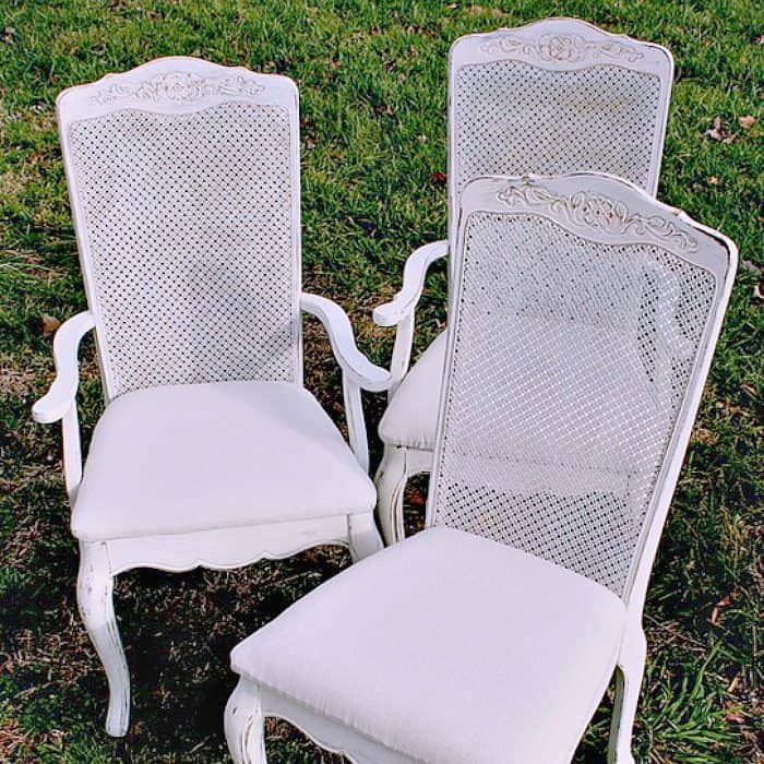 white shabby chic distressed chairs and drop cloth seats