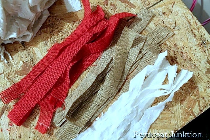 cut strips of burlap to make a garland