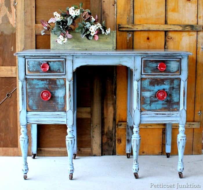 Distressed Furniture With Red Knobs