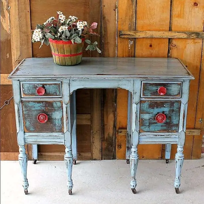 HARDWARE MATTERS-Distressed Dresser with Red Knobs