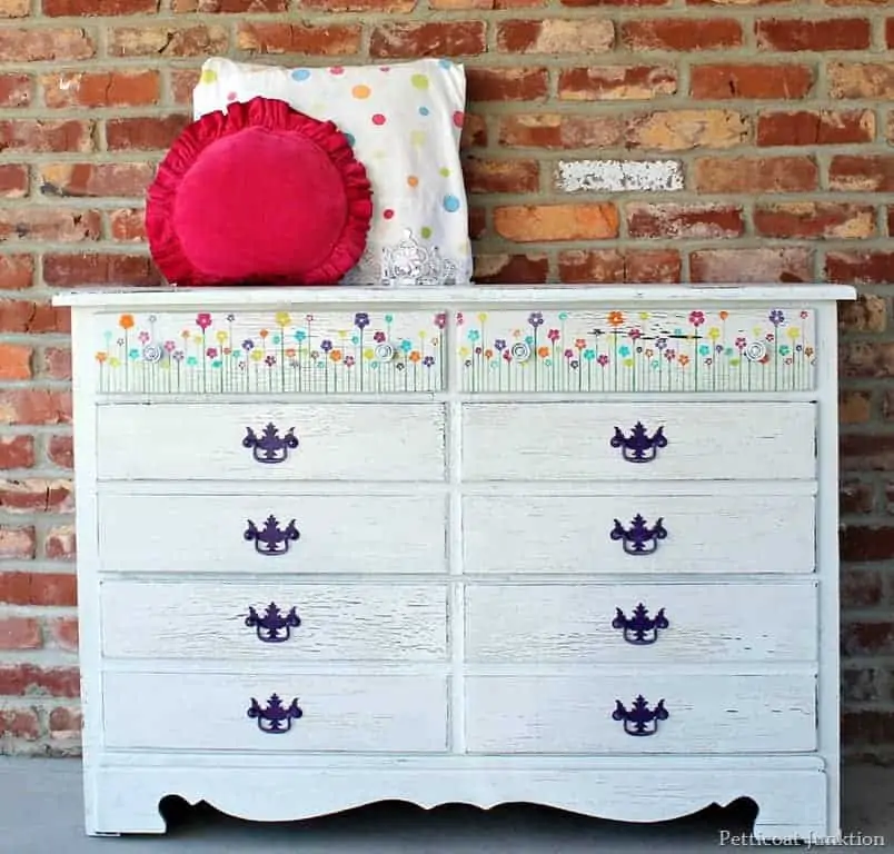 Simple Stenciled Flowers On A White Dresser
