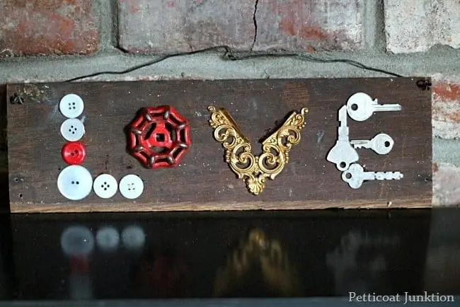 Make A Love Sign With Recycled Buttons And Keys