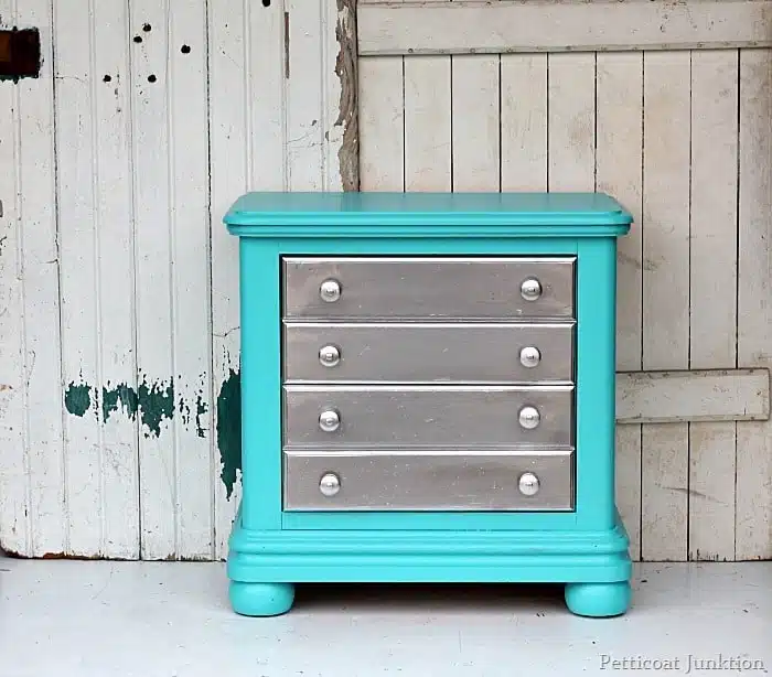 turquoise paint projects with silver spray paint on drawers