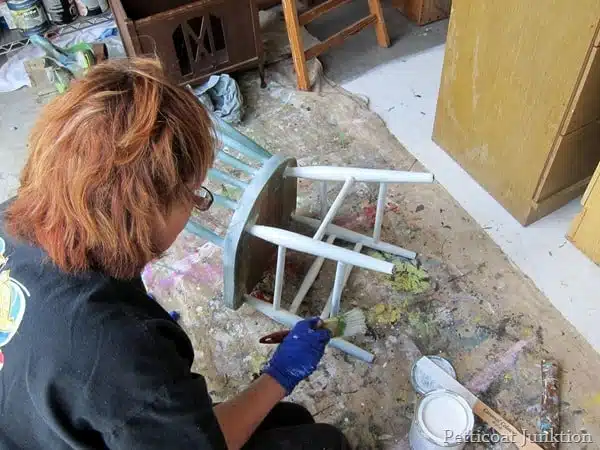 Kathy Petticoat Junktion painting a chair
