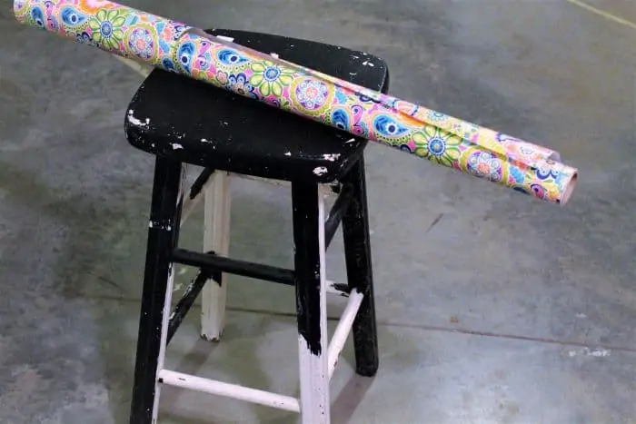 how to decoupage a bar stool with paper using Mod-Podge