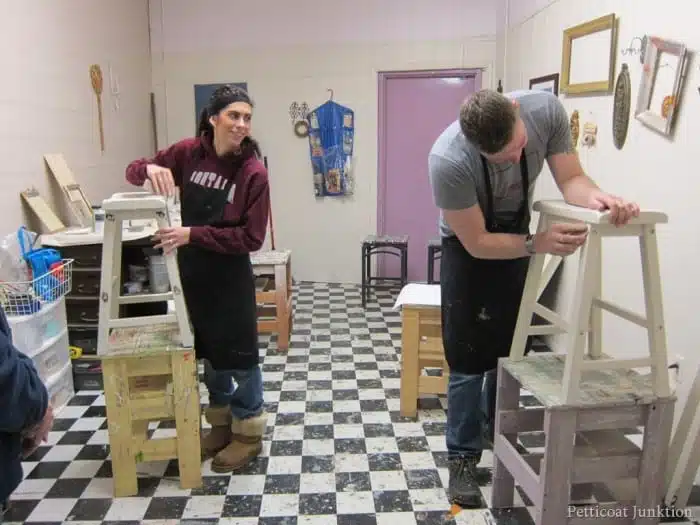 painting bar stools in a furniture painting workshop