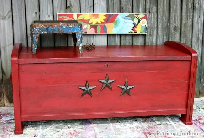 antiqued red cedar chest adorned with iron stars Petticoat Junktion