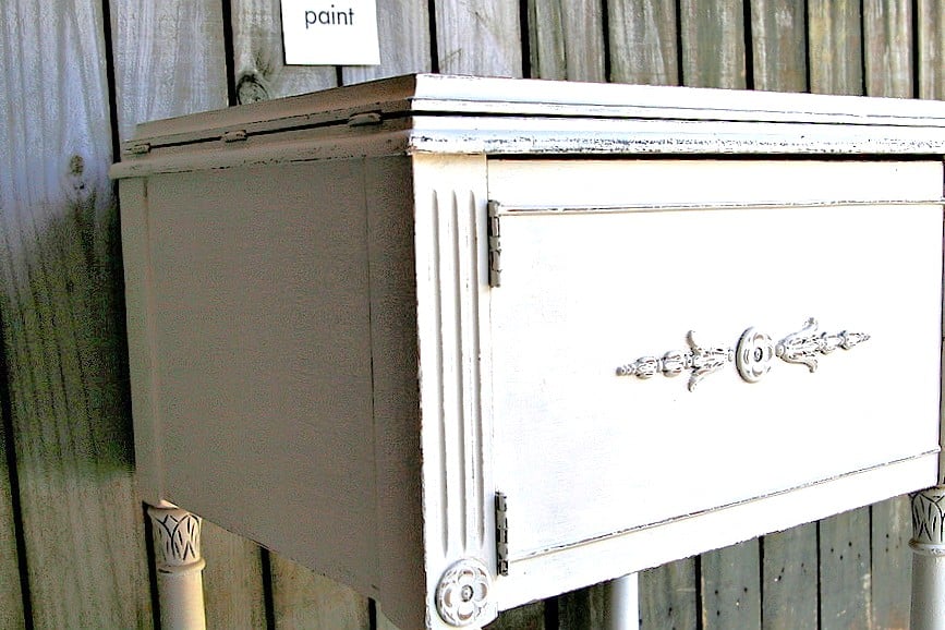 How to paint a sewing machine cabinet white and distress the paint to use the cabinet as a side table