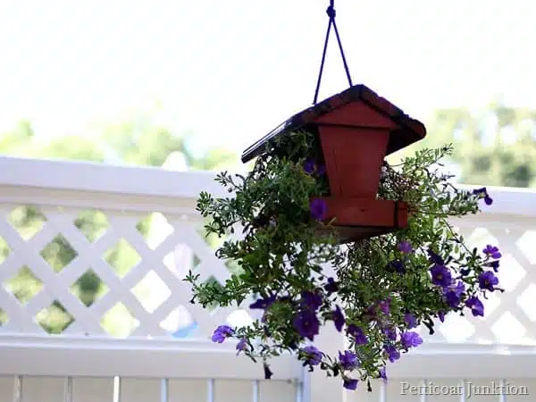 red painted bird feeder becomes hanging flower plainter Petticoat Junktion