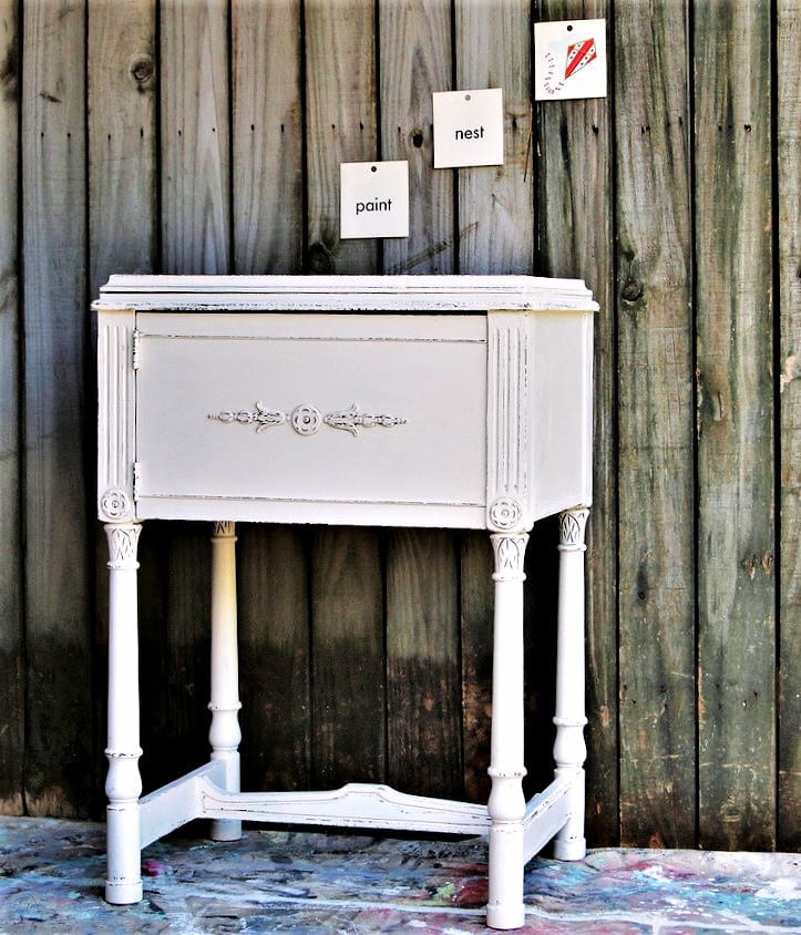 vintage sewing machine cabinet painted white with distressing 5