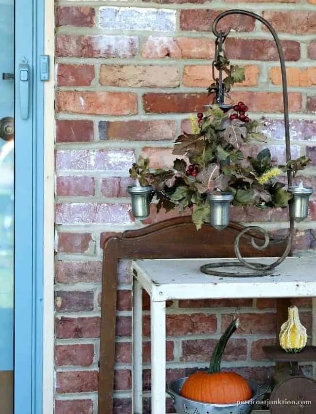 Art Deco Chandelier Repurpose Idea Using Candles And Greenery