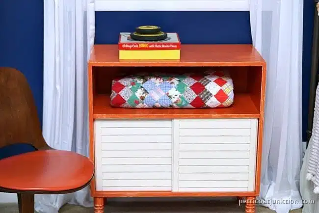 orange furniture and blue walls Petticoat Junktion