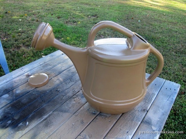 spray painted watering can
