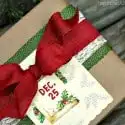 Christmas-gift-wrap-idea-burlap-ribbon-and-Kraft-paper-Petticoat-Junktion.jpg