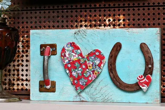 diy heart love sign made from recycled items