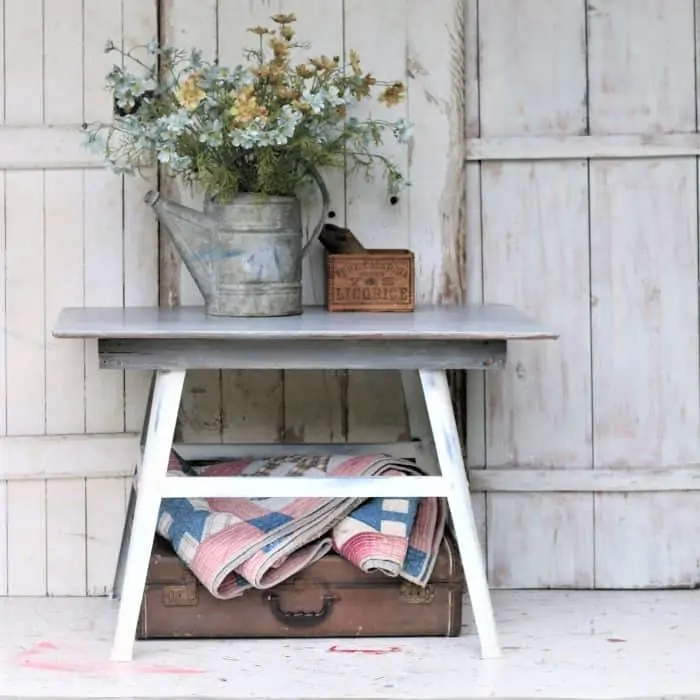 homemade recycled table with weathered paint finish 