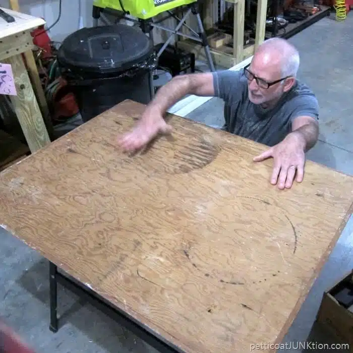 working on a table project in the workshop