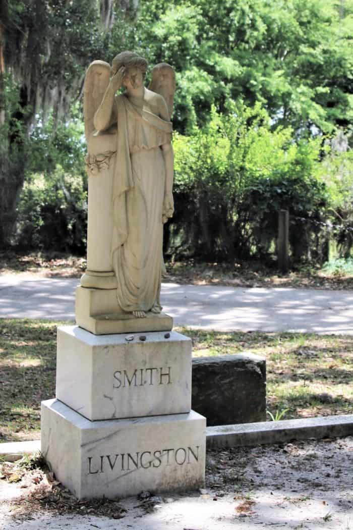 Livingston and Smith Statue of an Angel at gravesite Bonaventure Cemetery