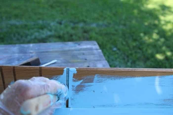 painting the drawer a beautiful beachy blue