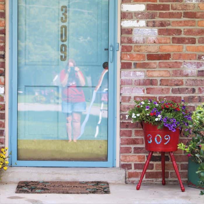 front porch with flower pot address planter