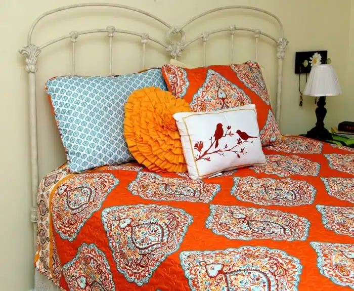 decorative bedding in turquoise and orange