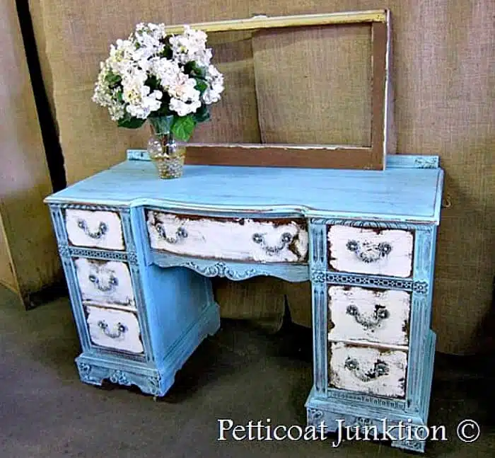 heavily distressed blue and white desk