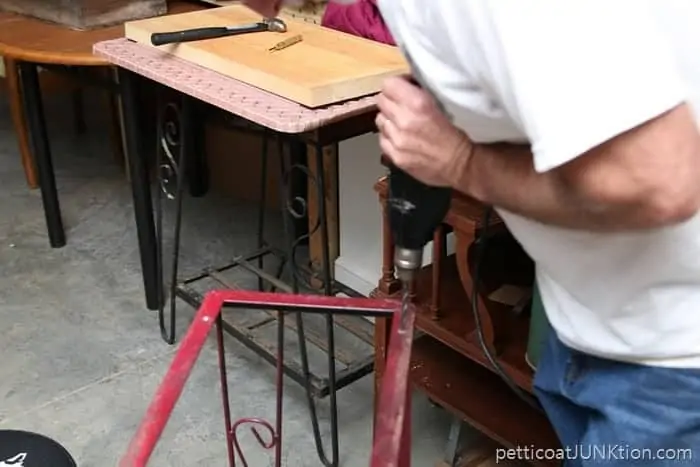 drilling screw holes in iron stand 