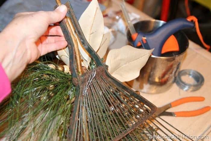 wire greenery sprig to the rake