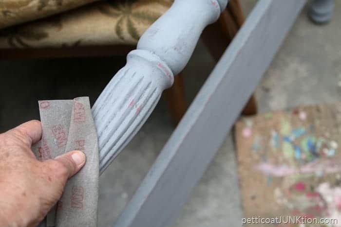 distressing paint with sandpaper and Vaseline