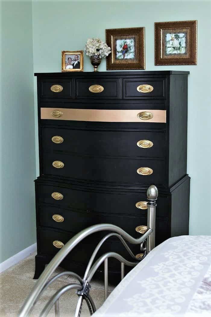 Black furniture with gold stripes