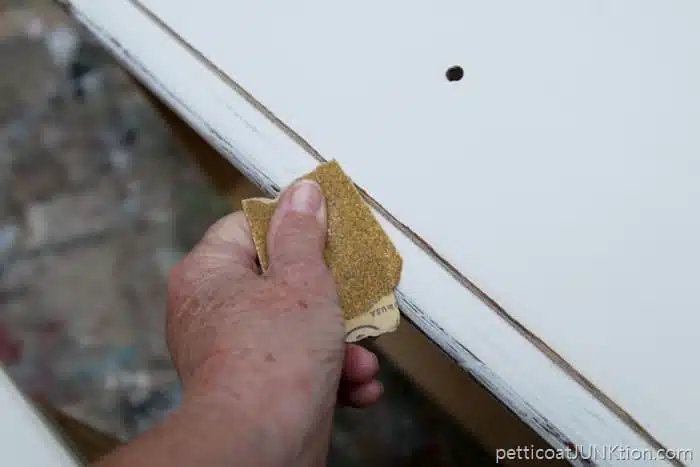 how to distress white paint with sandpaper by hand