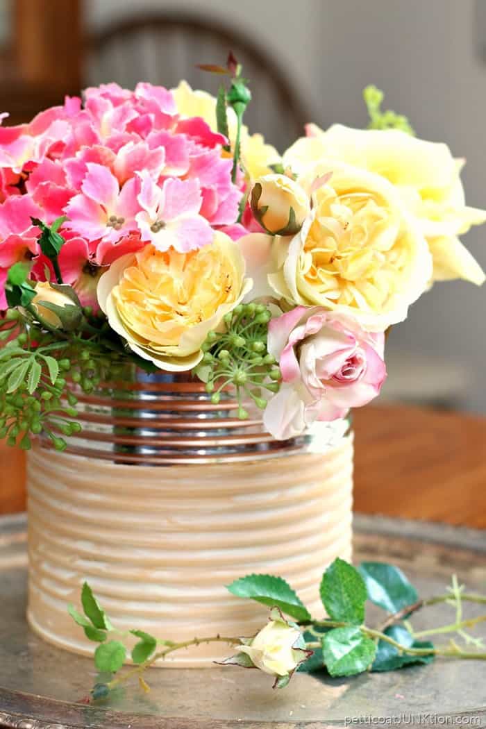 recycle a coffee can and make a pretty flower vase using paint and white wax