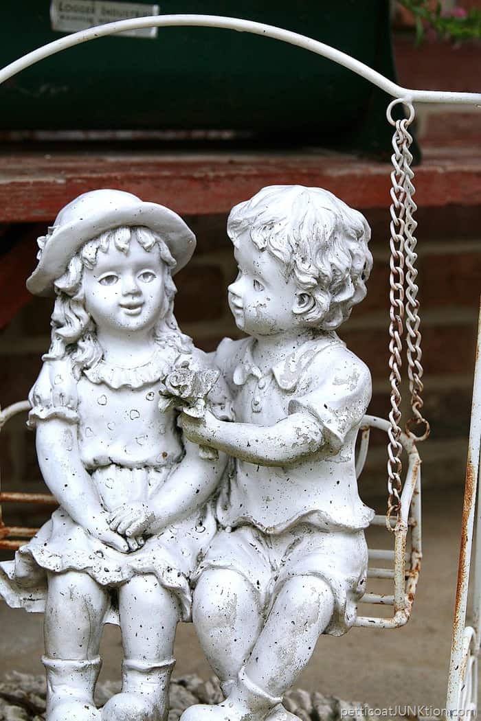 girl and boy garden statues