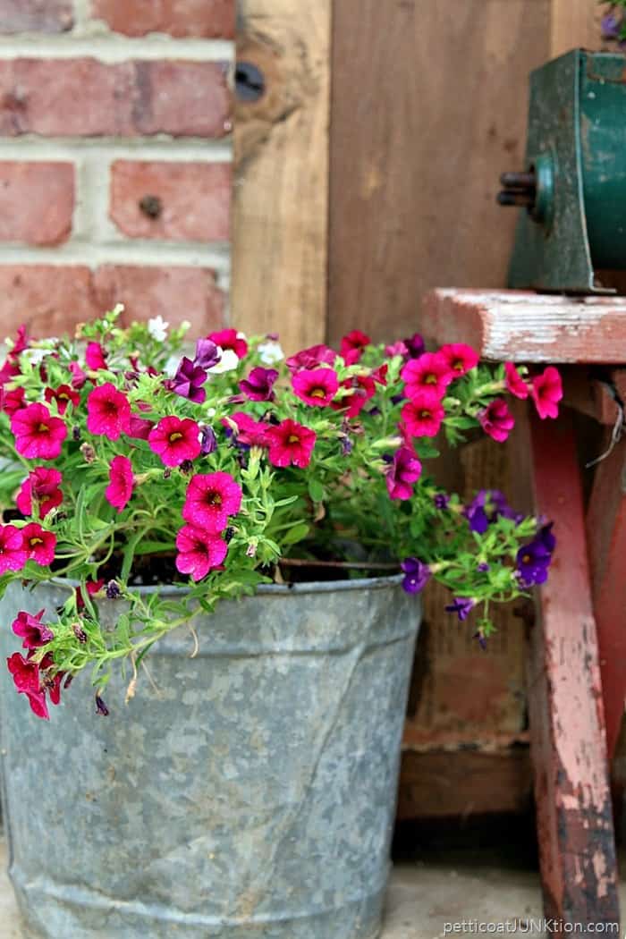 junk bucket flower planter