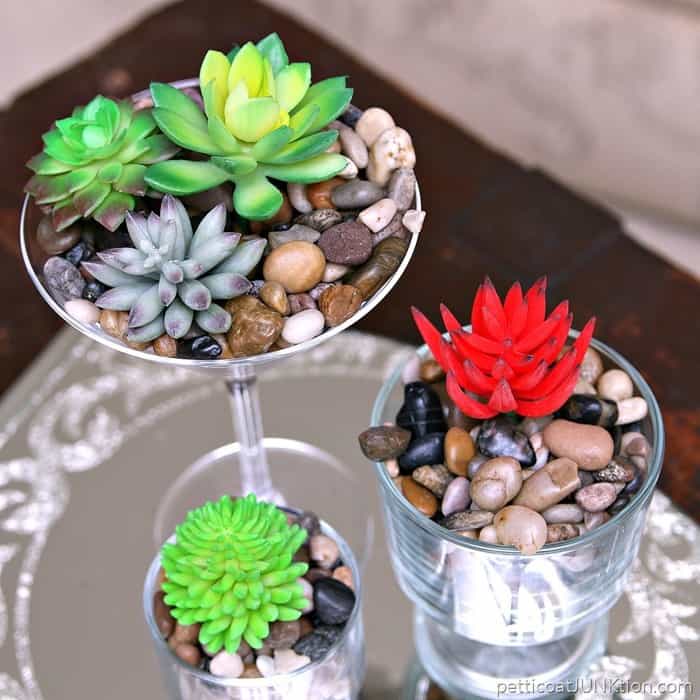 fancy faux succulents in thrift store glasses require no water