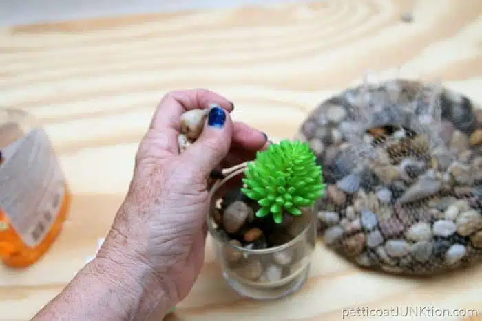 fill container with river rocks