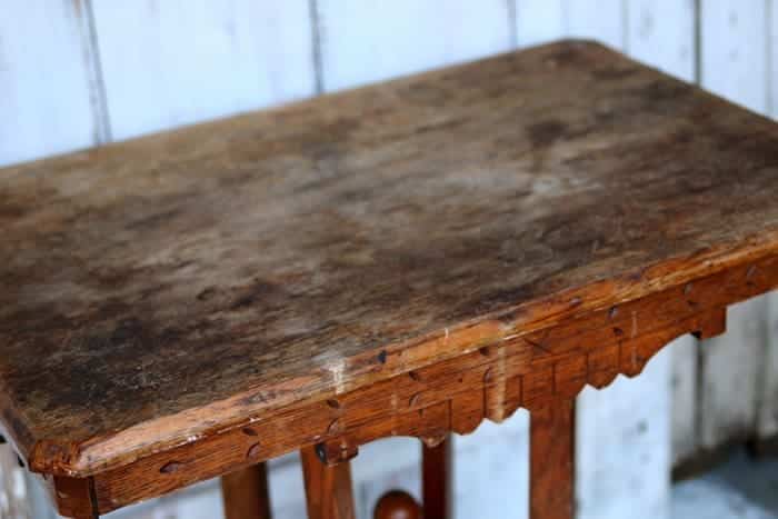 antique table in rough condition