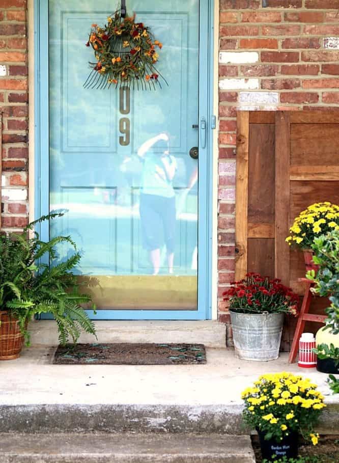 How To Paint A Metal Framed Storm Door And Wood Front Door   Birdhouse Flower Container And Rake Wreath Fall Porch Decor Thumb 666x909 