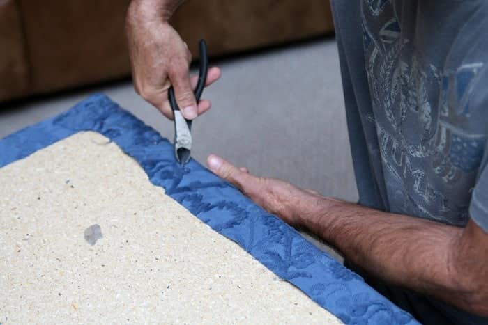 remove staples from seat cover