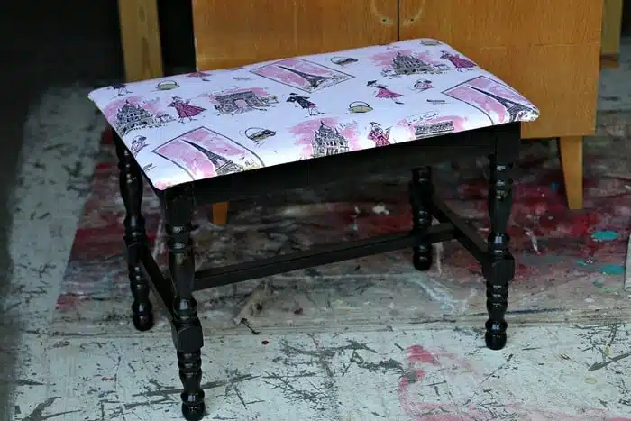 Pink Paris themed fabric looks great with black spray painted stool