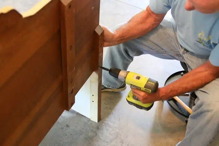 attaching the sides of the bench to the back