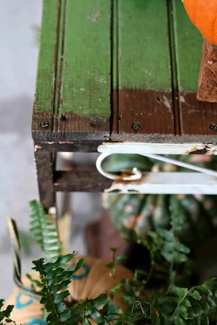 iron table base recycled with a wood top