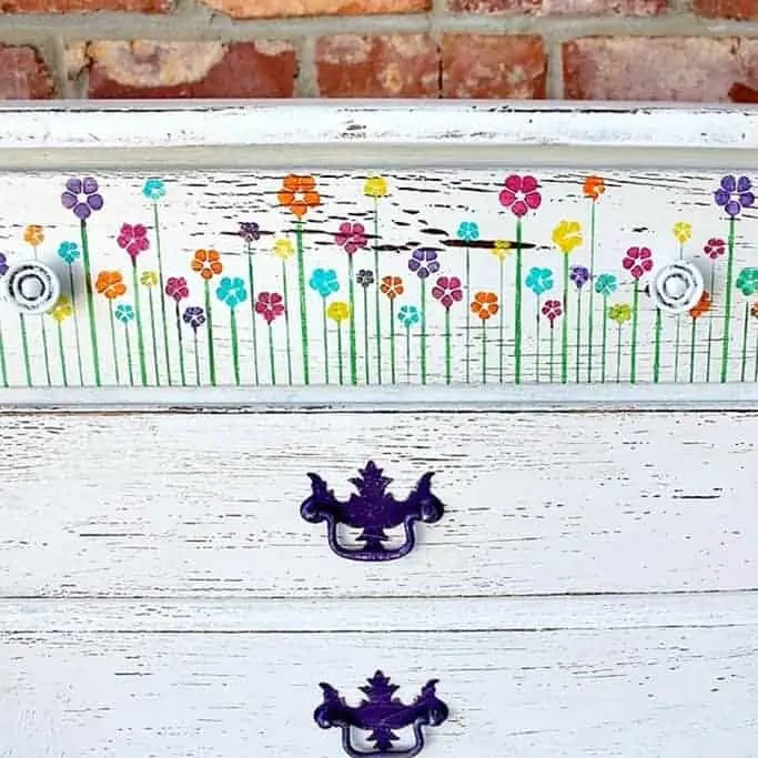 purple paint and stenciled flowers