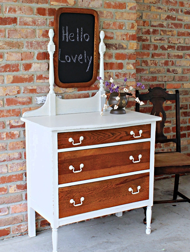off-white painted dresser showcases original finish