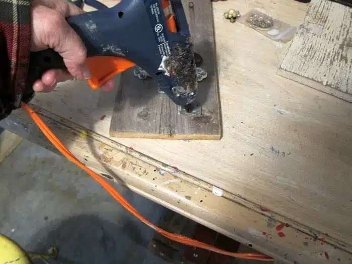 gluing the pieces to the board