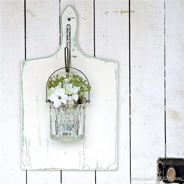 hanging glass wall vase made from thrift store finds